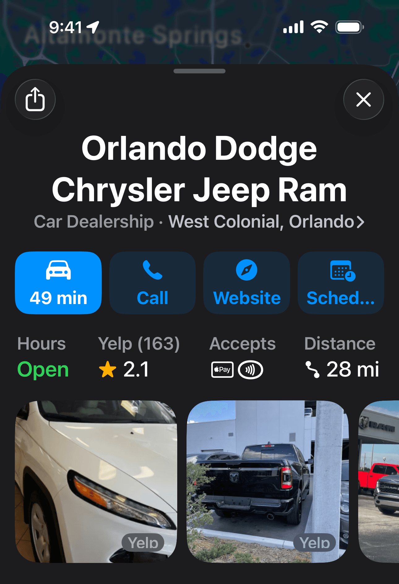 Apple Maps listing: Orlando Dodge Chrysler Jeep Ram showing Yelp 2.1 stars